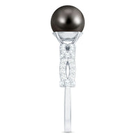 7.5 carat black pearl and diamond engagement ring by Rosec Jewels, featuring a central black pearl and sparkling diamonds in a elegant ring setting.