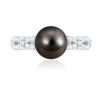 7.5 carat black pearl and diamond engagement ring by Rosec Jewels, featuring a central black pearl with diamond accents in a luxurious ring setting.