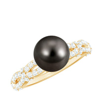 7.5 carat genuine black pearl and diamond engagement ring by Rosec Jewels, featuring a central black pearl surrounded by sparkling diamonds.