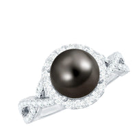 Real Tahitian pearl and diamond crossover engagement ring by Rosec Jewels featuring a lustrous pearl and sparkling diamonds in a elegant design.