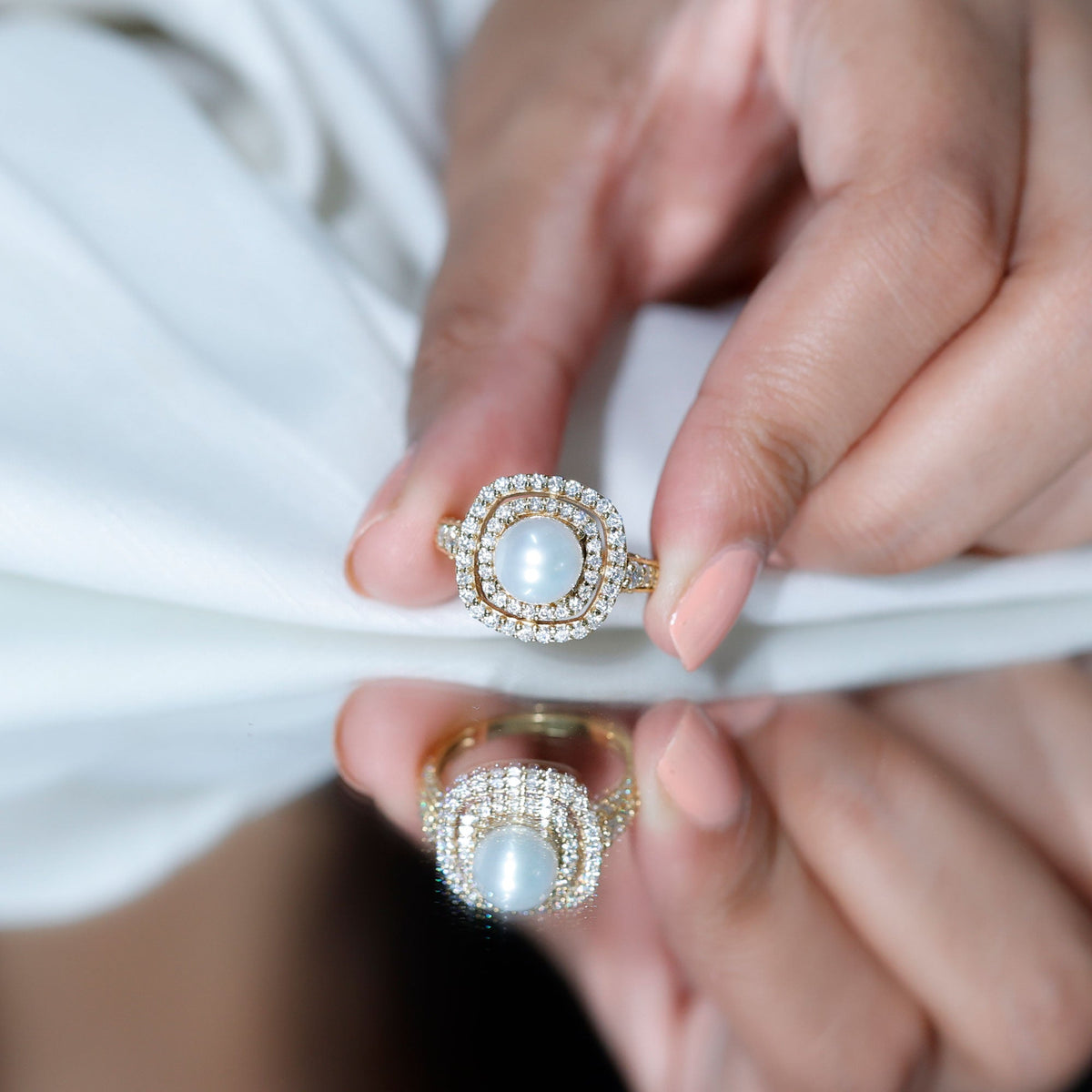 7.4 carat freshwater pearl double halo engagement ring with moissanite by Rosec Jewels, showcasing a stunning pearl centerpiece and sparkling halo.