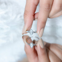 Bezel Set Moissanite Marquise Engagement Ring in Split Shank