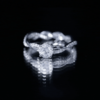 Round Cut Moissanite Braided Engagement Ring