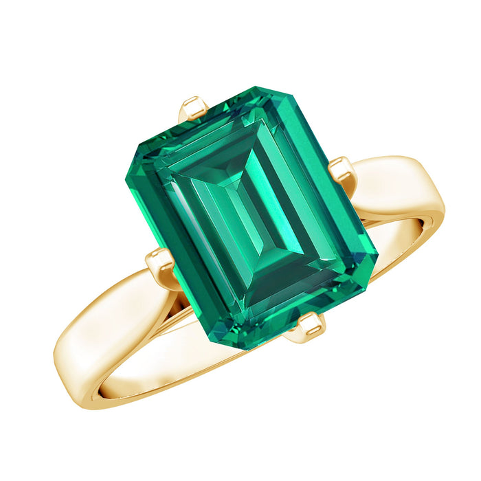 Octagon lab-grown emerald solitaire engagement ring with a silver band, featuring an 8x10 mm emerald gemstone.