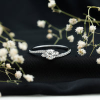 Round Shape Moissanite Bypass Engagement Ring with Side Stones