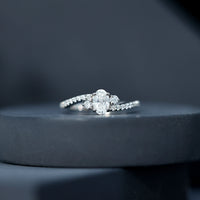Oval Moissanite Bypass Engagement Ring with Side Stones