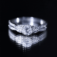 Lab Grown Diamond Round Engagement Ring With Side Stone