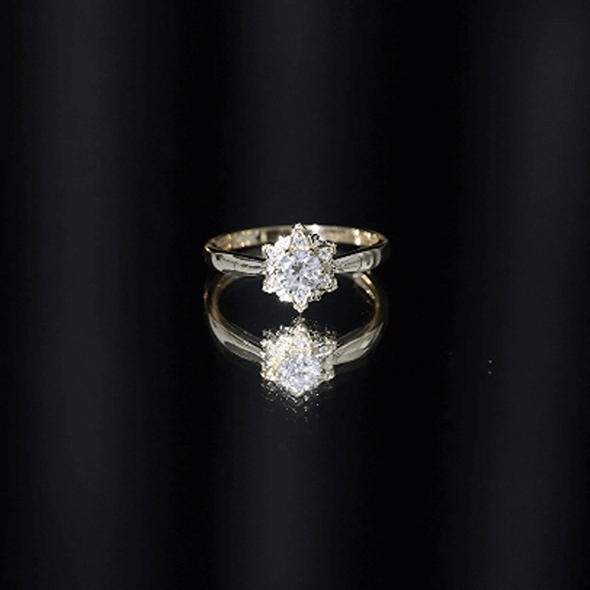 Yellow gold floral engagement ring with lab-grown diamond by Rosec Jewels, showcasing intricate floral design and sparkling center stone.