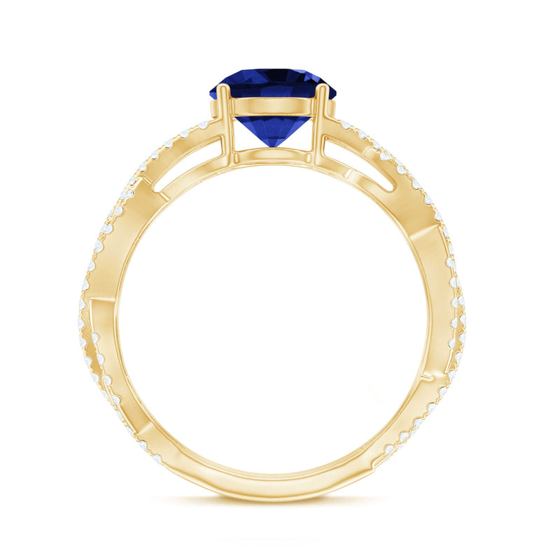 Rosec Jewels designer 2.7 carat lab-grown blue sapphire engagement ring with diamond criss-cross shank, elegant and sparkling.