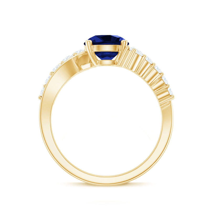 Certified 2.7 carat lab-grown blue sapphire engagement ring with diamond bypass shank, showcasing a stunning gold ring design.