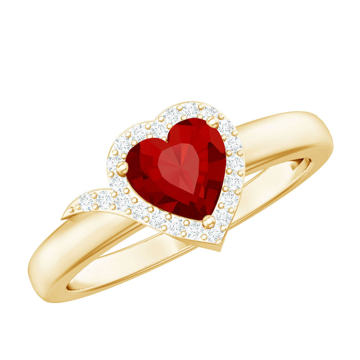 Lab grown ruby heart engagement ring with diamond halo, 6mm size, featuring rose gold band and intricate detailing.