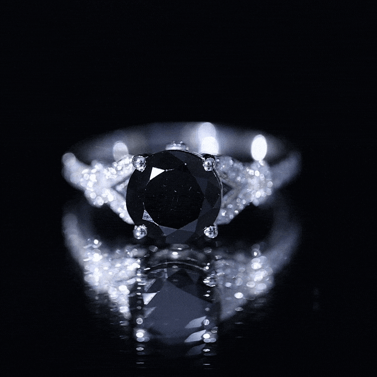 Lab grown black diamond solitaire engagement ring from Rosec Jewels featuring a sleek yellow band and a prominent black diamond centerpiece.