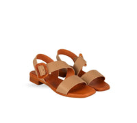 Menina Step Juliette Side Buckle Nude sandal with ankle strap, handmade in Spain, featuring a sleek nude leather design.