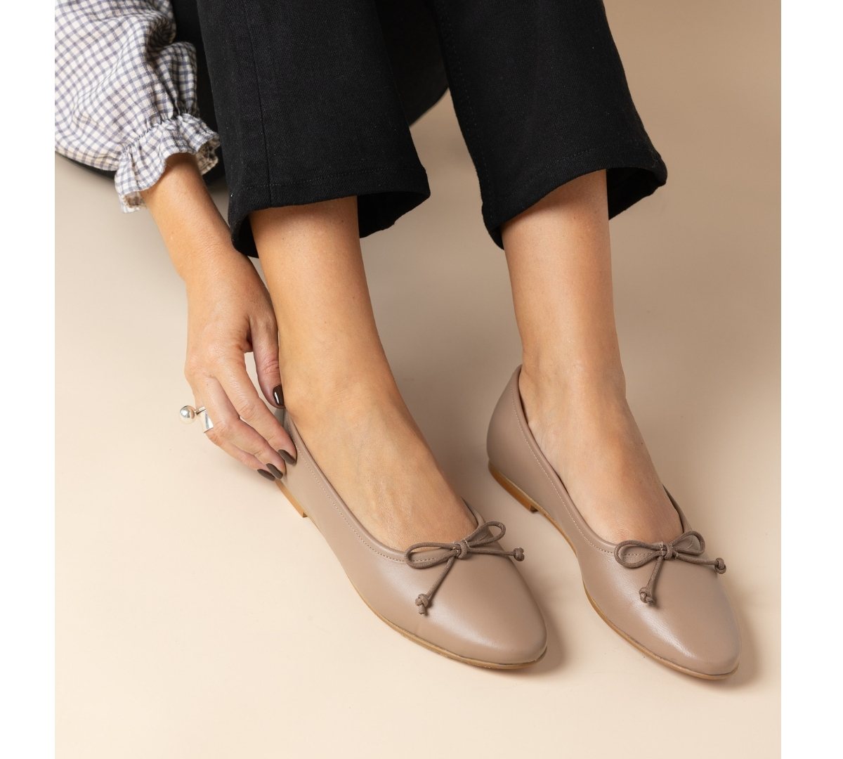 Handmade Belle Taupe Leather accessory by Menina Step, showing detailed close-up of soft taupe leather texture.