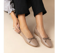 Handmade Belle Taupe Leather accessory by Menina Step, showing detailed close-up of soft taupe leather texture.