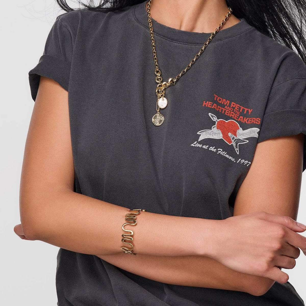 Gold Voyager Necklace by Mignonne Gavigan featuring delicate chain and elegant pendant, displayed on a neutral background.
