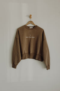 Cropped crew neck t-shirt featuring the phrase "Jesus, I Trust in You" in black lettering, from Abundantly Yours Shop.