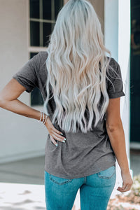 Women's American football T-shirt by Adelyne's Boutique featuring a stylish design, perfect for game day or casual wear.