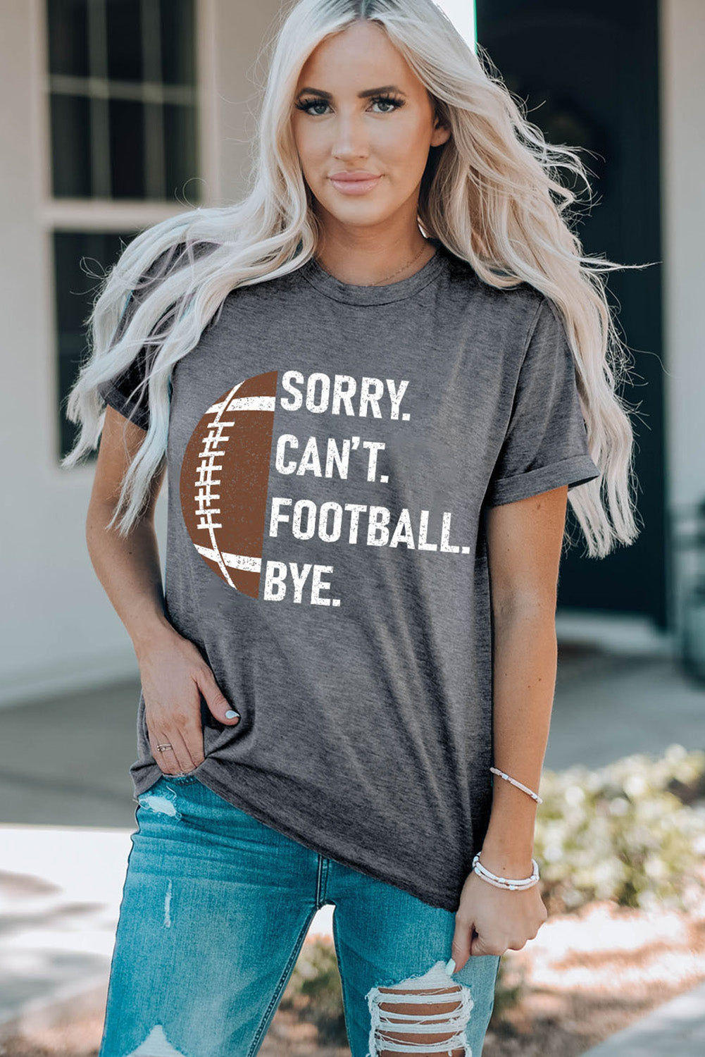 Women's American football T-shirt by Adelyne's Boutique featuring a sporty design and comfortable fit.