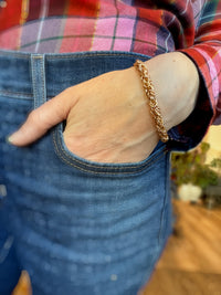 14K gold fill Byzantine chainmaille bracelet worn on a model, showcasing intricate jewelry craftsmanship.