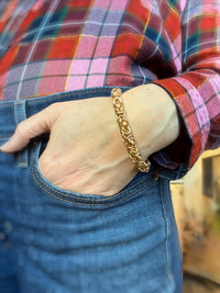 14K gold-filled chunky Byzantine chainmaille bracelet by Alison Morse worn on a model's wrist.