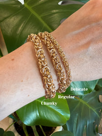 14K gold fill Byzantine chainmaille bracelet by Alison Morse, showcasing its chunky, intricate design and size comparison.