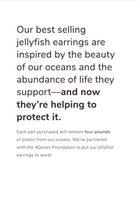 Green copper jellyfish earrings with white pearls and sterling silver earwires, designed by Alison Morse.