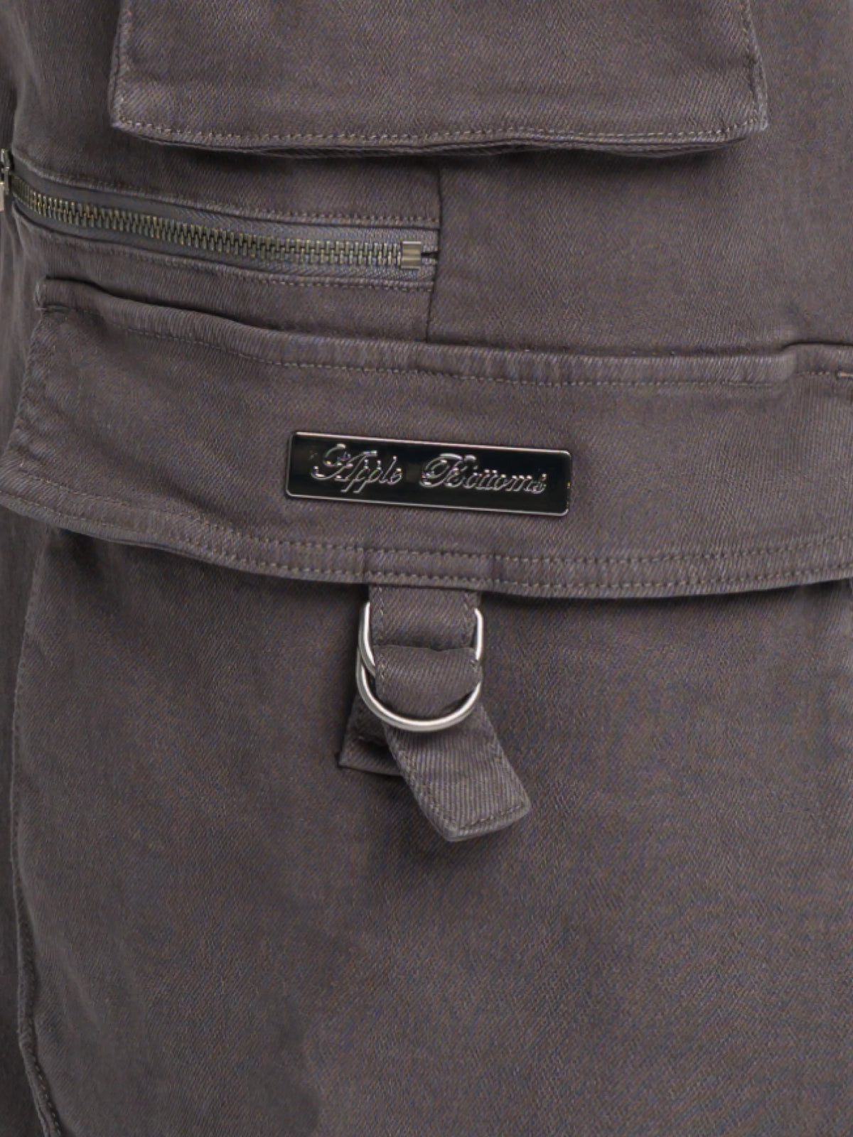 Low-rise twill cargo pant by Apple Bottom Jeans, featuring multiple pockets and a relaxed fit, shown in a casual style.