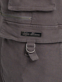 Low-rise twill cargo pant by Apple Bottom Jeans, featuring multiple pockets and a relaxed fit, shown in a casual style.