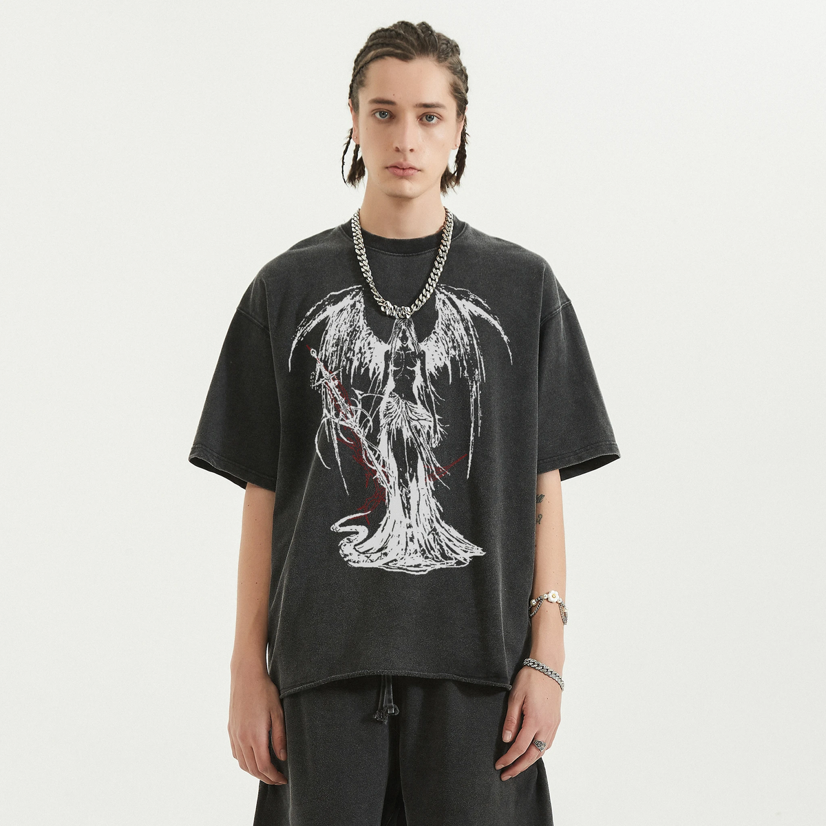 Black Fallen Angel streetwear T-shirt by ArnukiClothing featuring garment-dyed cotton, 260GSM fabric, and a faded raw hem.