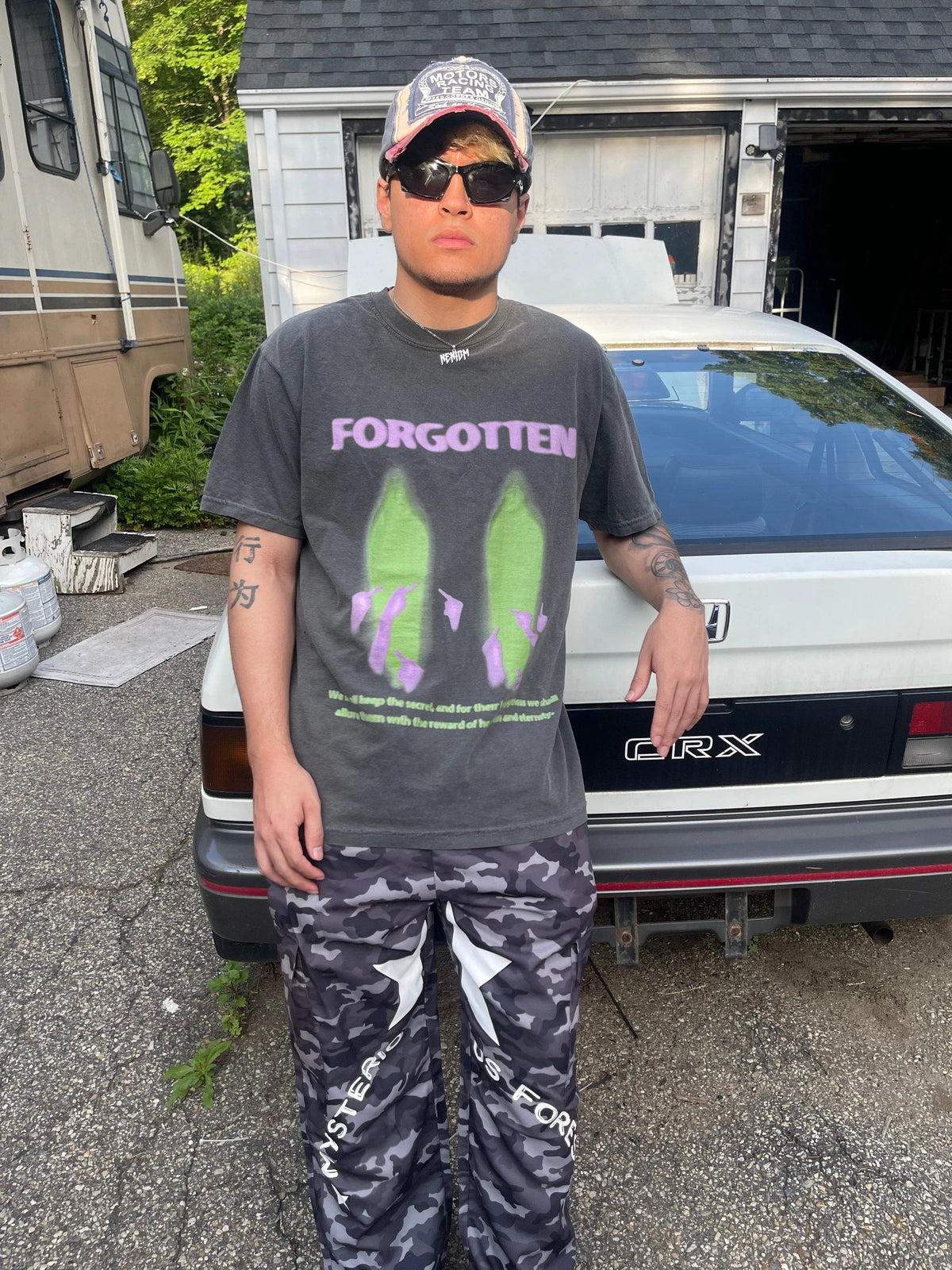 Cotton short sleeve streetwear T-shirt featuring paranormal forgotten garment dye design by ArnukiClothing.