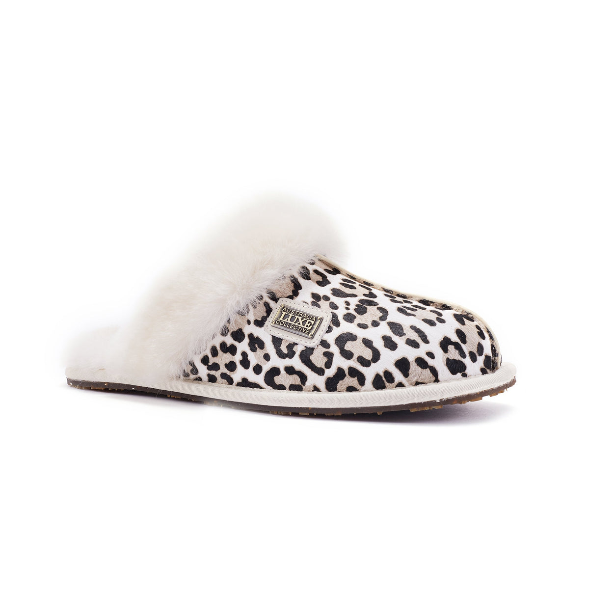 Australia Luxe Collective closed mule slippers in snow leopard print, featuring soft fabric and cozy slip-on design.