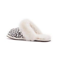 Australia Luxe Collective closed mule slippers in snow leopard print, featuring a cozy slip-on design and plush fur exterior.