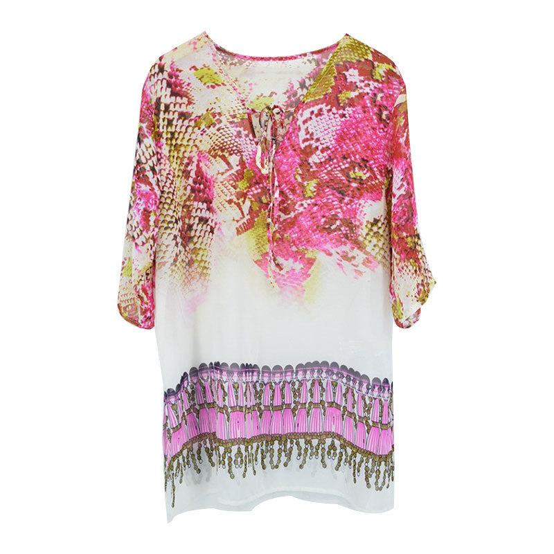Bella Mia serpentine chiffon beach cover-up jacket over bikini swimwear, lightweight and stylish for seaside fashion.