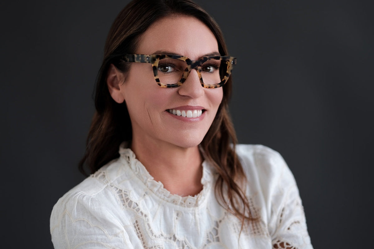 Black Oliver reading glasses by Benny's Eyewear with clear lenses and stylish frame, designed for comfortable reading.