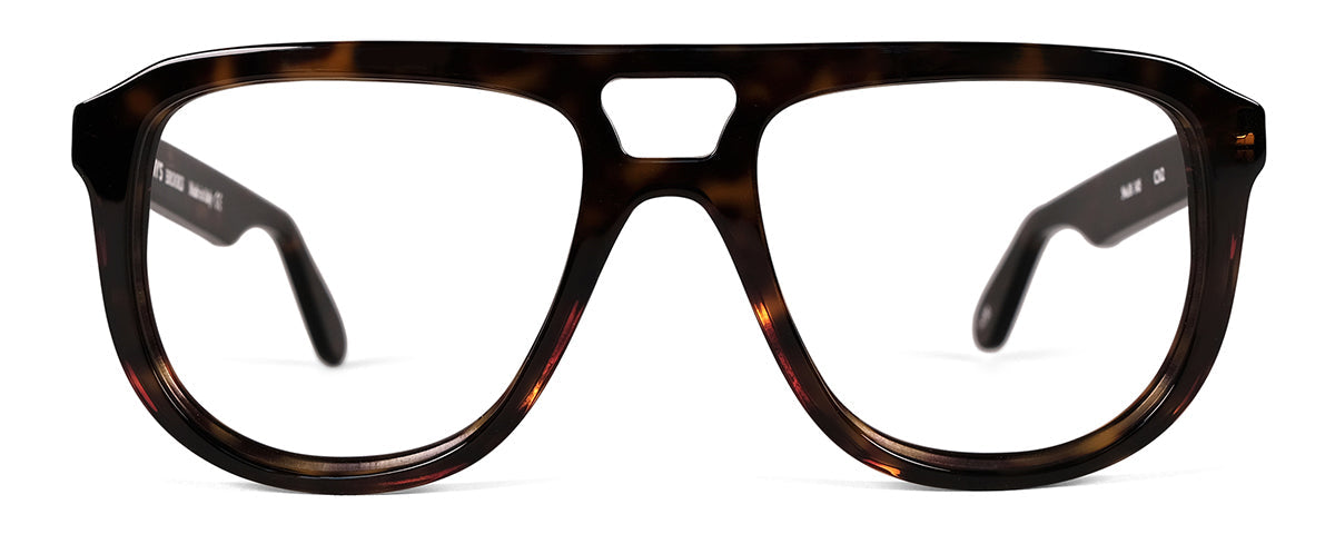 Dark tortoise reading glasses by Brooks from Benny's Eyewear, featuring a classic style and clear lenses for comfortable reading.