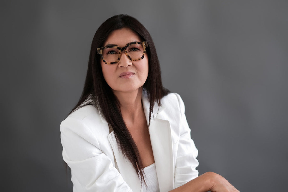 Black Kathryn reading glasses by Benny's Eyewear with clear lenses and a sleek, modern frame design.