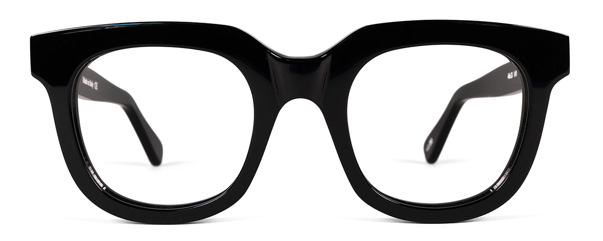 Black Kathryn reading glasses by Benny's Eyewear with clear lenses and stylish frame, designed for comfortable reading.