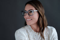 Green Gianna reading glasses by Benny's Eyewear with clear lenses and stylish frame.