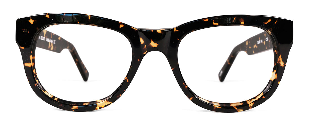 Benny's Eyewear Elliot reading glasses with spotted tortoise frames and 1.00 magnification, close-up view of stylish eyewear.