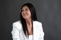 Wilson reading glasses by Benny's Eyewear with gold frames and 1.00 magnification, shown in a close-up image.