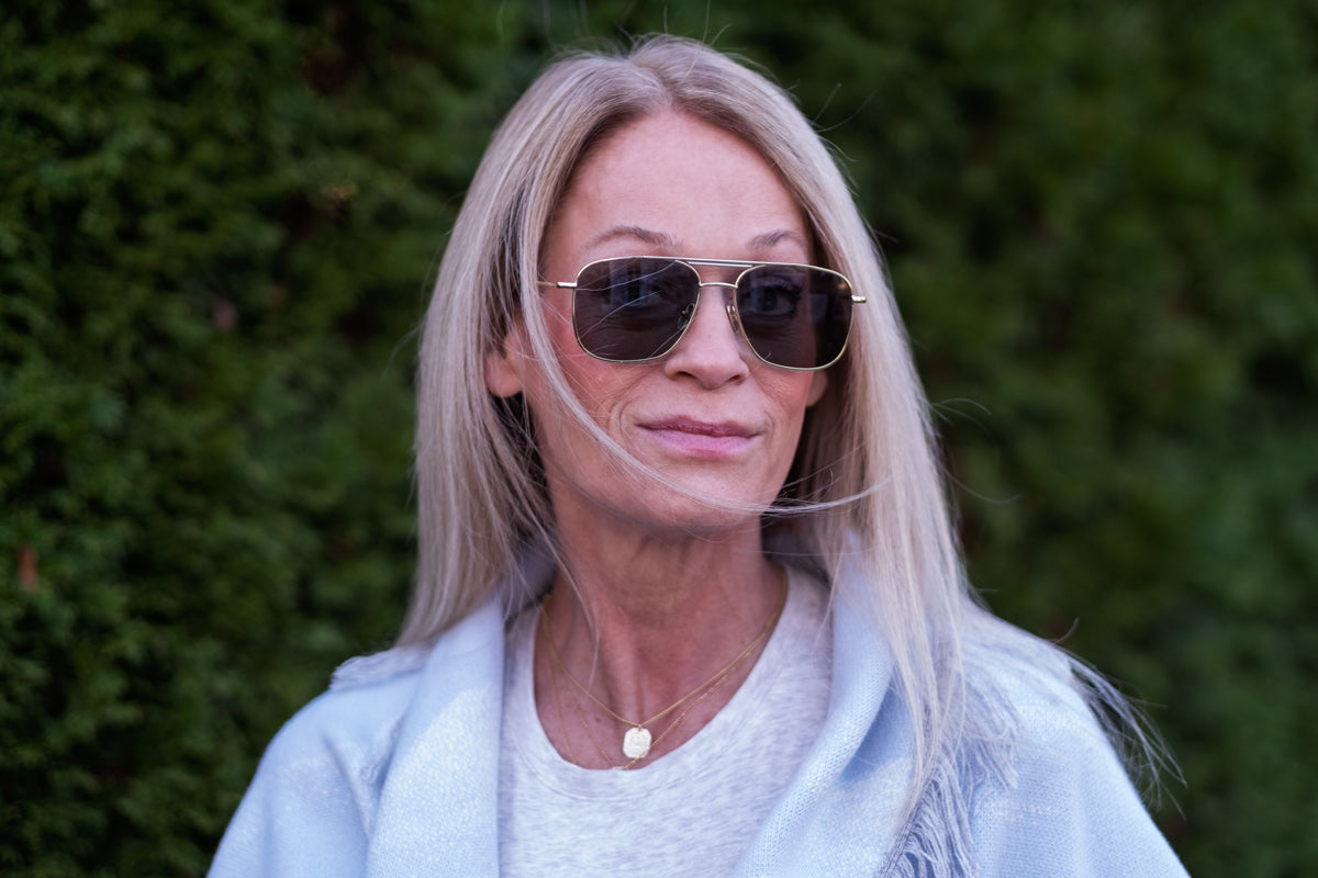 Benny's Eyewear Largo sunglasses with black frames and dark tinted lenses, stylish eyewear for sun protection.