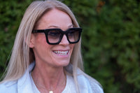 Gray Nora sunglasses by Benny's Eyewear with sleek frame and tinted lenses, perfect for stylish sun protection.
