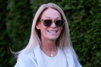 Green Lincoln sunglasses by Benny's Eyewear with stylish frame and tinted lenses, perfect for outdoor fashion.