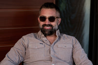Green Lincoln sunglasses by Benny's Eyewear featuring sleek frames and tinted lenses.