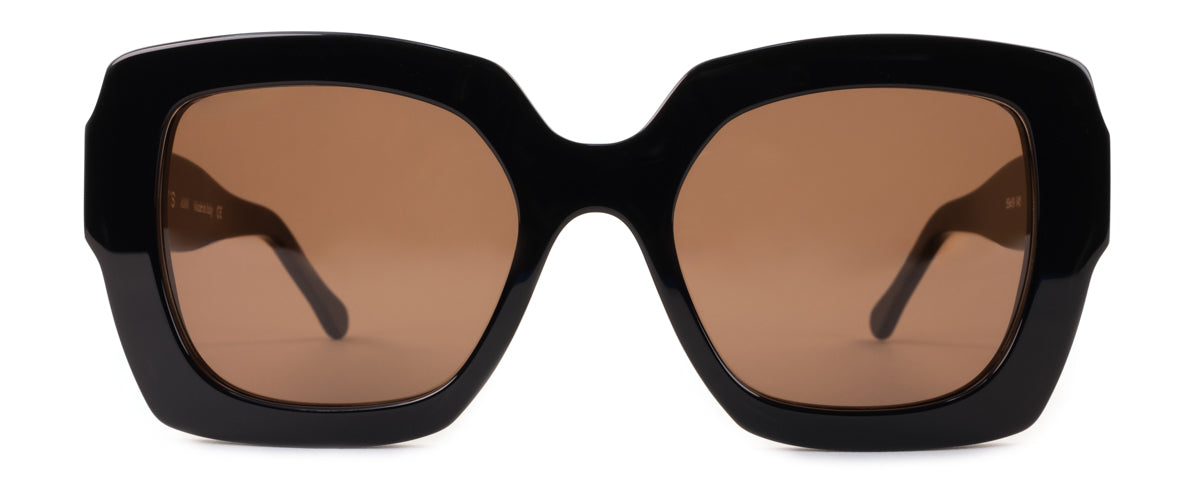 Grey Ann sunglasses by Benny's Eyewear featuring a stylish frame and tinted lenses on a white background.