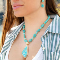 Blue turquoise triangle pendant necklace with gold chain from Barse Jewelry, showcasing a stylish boho jewelry design.