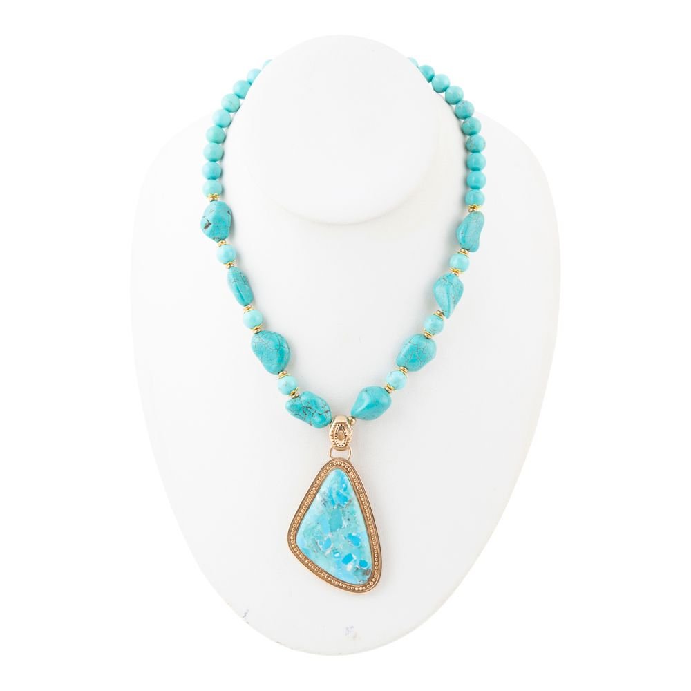 Blue turquoise triangle pendant necklace by Barse Jewelry featuring a gold chain and vibrant gemstone centerpiece.