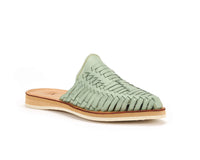 Teal Marbella Huarache Slip-On shoes by Bottomless Co., showcasing the stylish, comfortable design with woven details and open back.