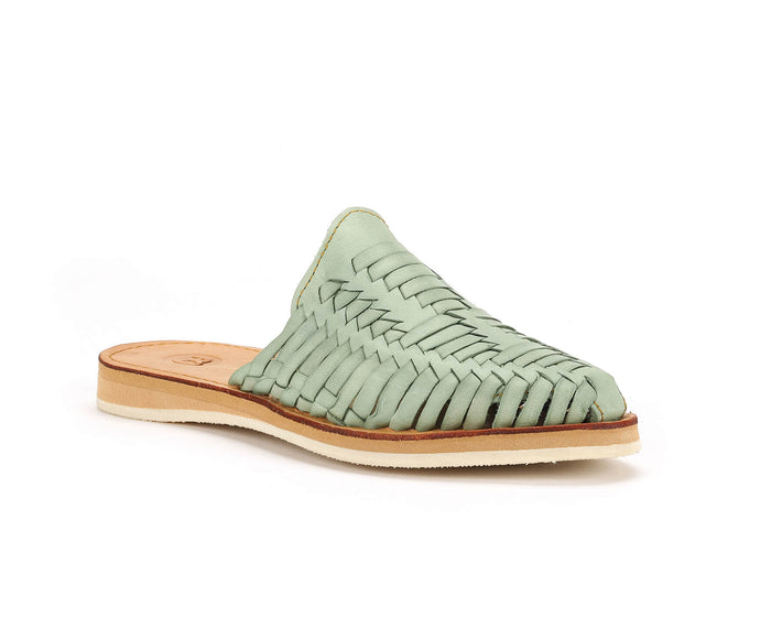 Teal Marbella Huarache Slip-On shoes by Bottomless Co., showcasing the stylish, comfortable design with woven details and open back.